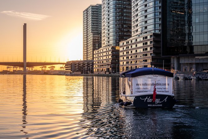 2-Hour Self-Drive Boat Hire on the Yarra River - Melbourne Cricket Ground and the Federation Square skyline pass