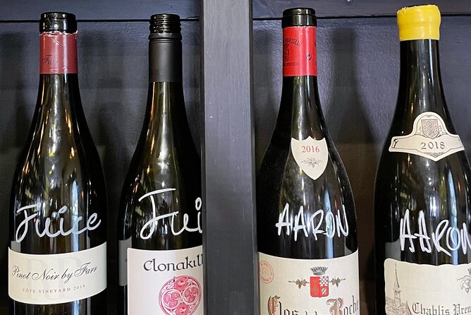 Melbourne Art, History, Wine & Food Walking Tour - The wine bar stop: dark wood, cherry seats, and three tastings
