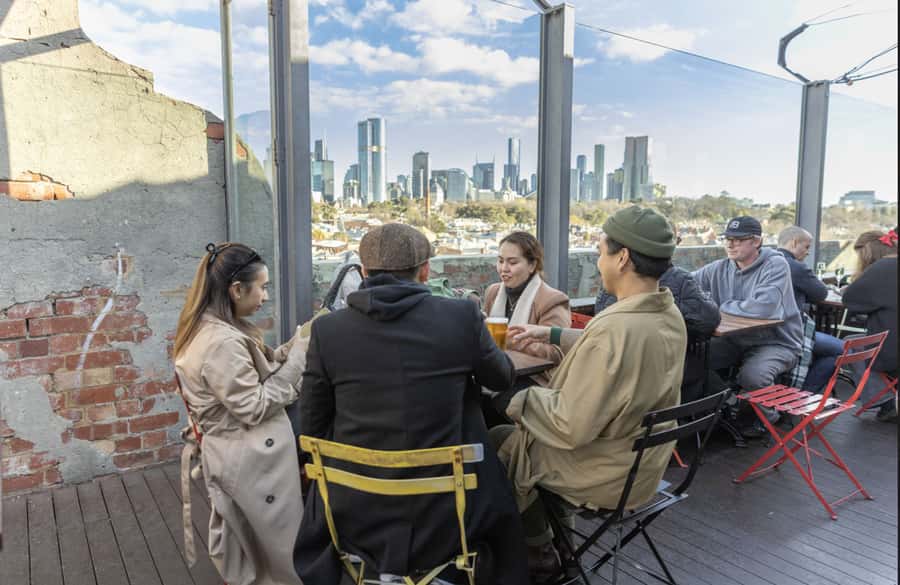 Melbourne: City Highlights, Suburbs & Laneways Bus Tour - From Protagonist Cafe to the first sights: how the tour starts
