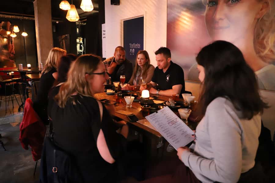 Melbourne: Hidden Bars & Laneway Legends Walking Tour - Old Treasury Building, Hotel Windsor, and Meyers Place: architecture with stories attached