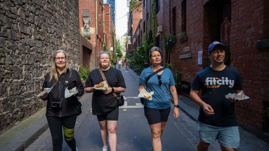 Melbourne: History and Donuts Walking Tour - Old Melbourne Gaol to State Library Victoria: the darker chapter, then the beautiful finish