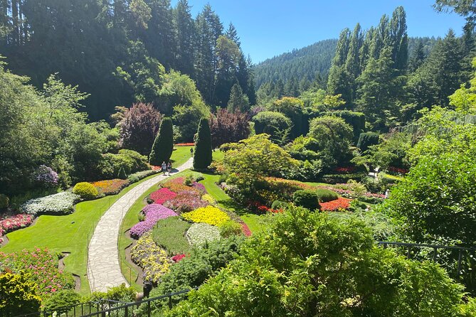 Private Tour of Gorgeous Victoria and to Butchart Gardens! (4 hr) - Craigdarroch Castle exterior and Mile Zero photos: quick stops with big payoff